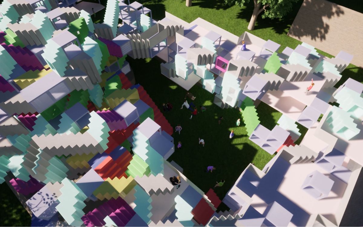 Aerial view of colorful modular playground maze with staircases and tunnels on a grassy courtyard