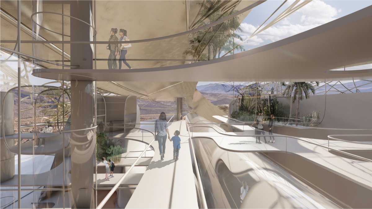 Interior render of campus walkways with desert mountains visible through glass walls